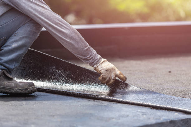Professional Basement Waterproofing technician working in Alfred, NY